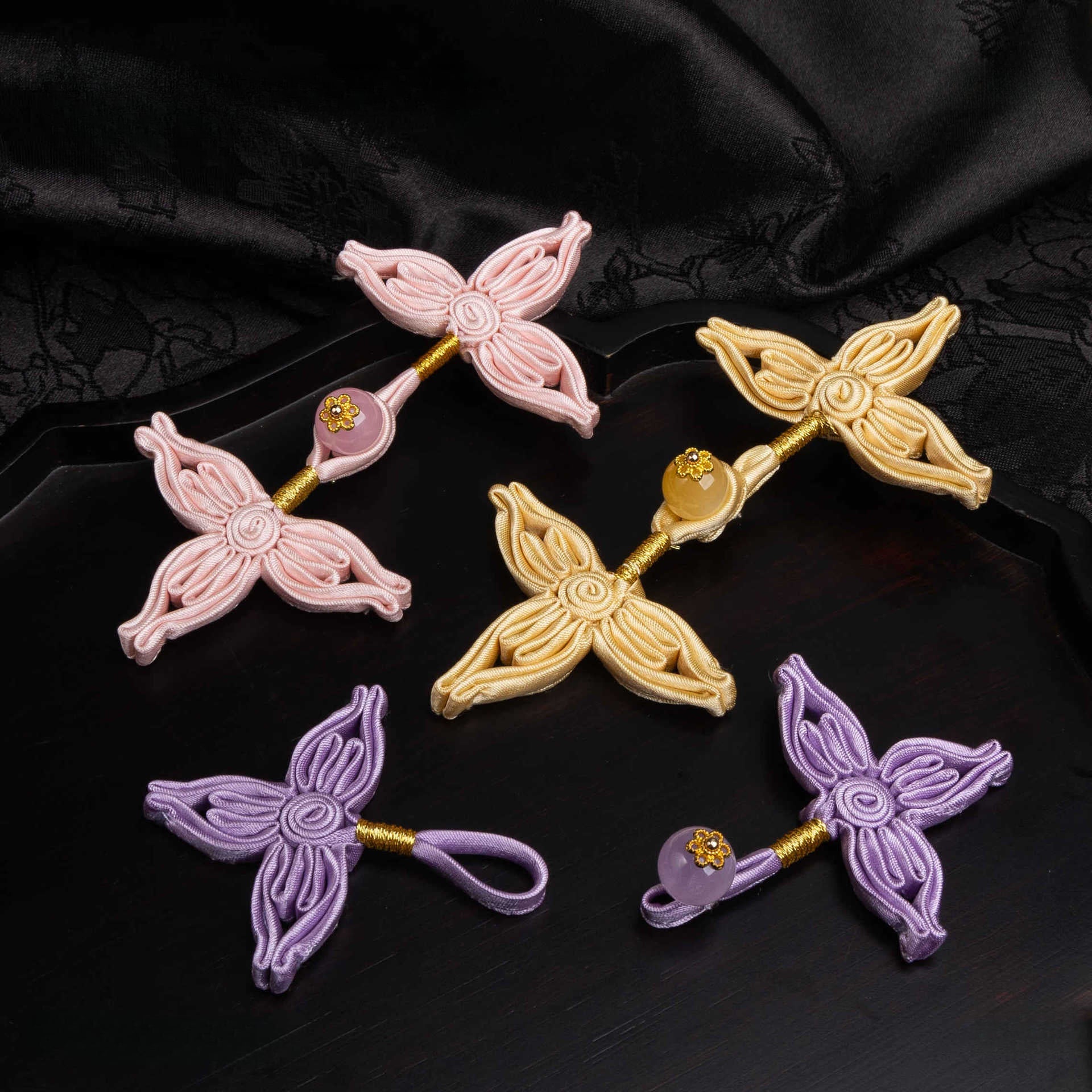 Four Wing Knot Button with Round Bead - Light Purple color, handmade decorative sew-on button